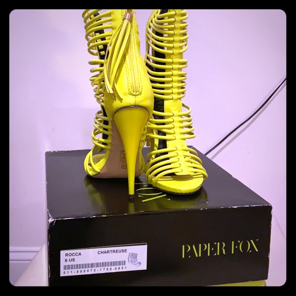 Neon yellow strappy heels